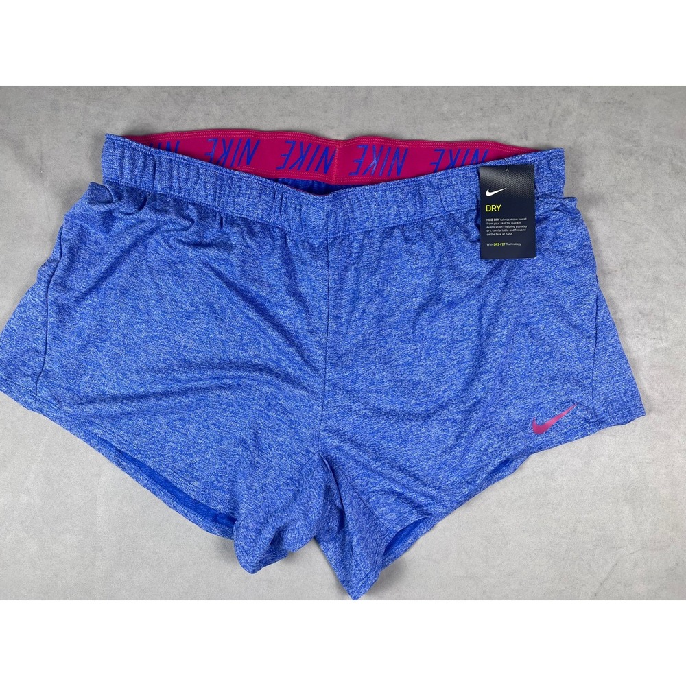 Nike Women's Blue Athletic Shorts with Pink Logo Waistband